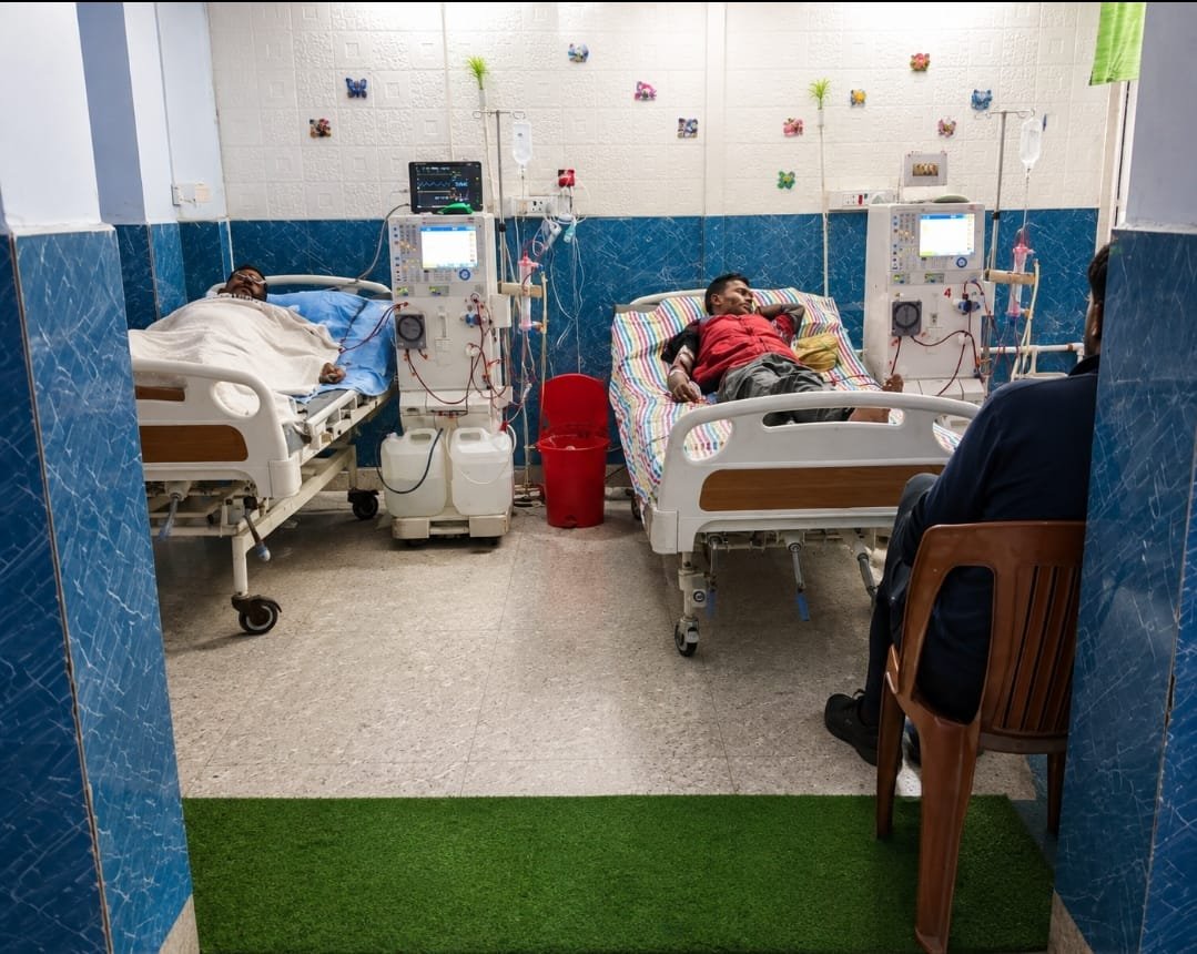 Dialysis treatment area with patient beds and dialysis machines